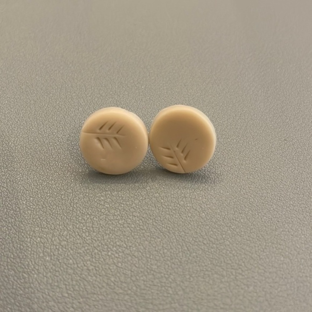 Cream circular earrings